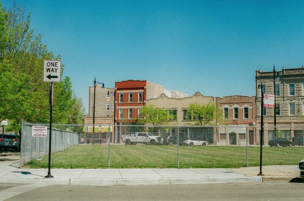 Large commercial property secured with durable chain link fencing.